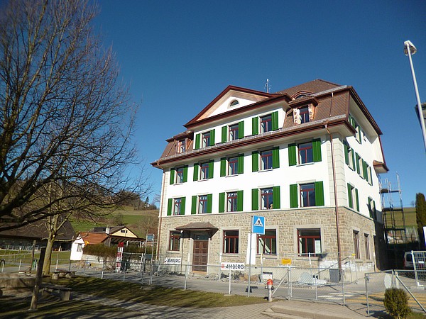 BEPA Heinz Imboden AG Weißes Haus mit grünen Fensterläden